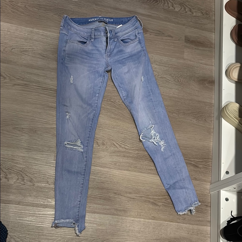 EUC size 4 super stretch American Eagle Outfitters Blue Skinny Jeans Distressed